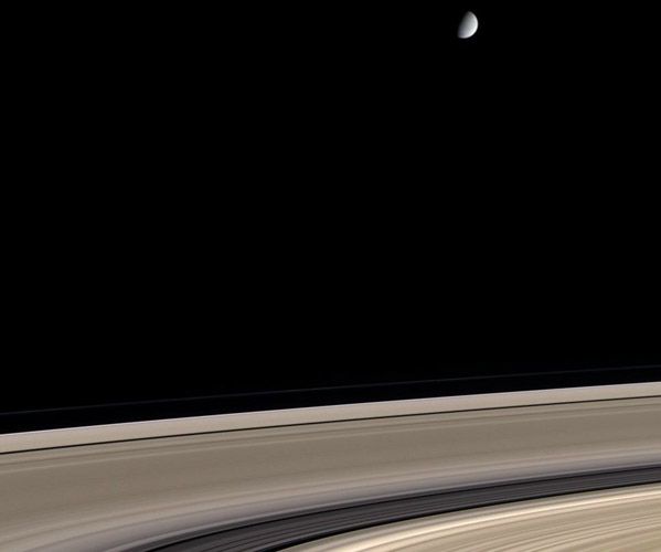 Saturn: Dirty Rings and a Clean Moon