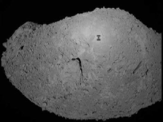 A Robot's Shadow on Asteroid Itokawa