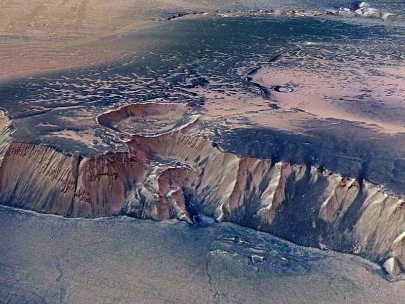 High Cliffs Surrounding Echus Chasma on Mars