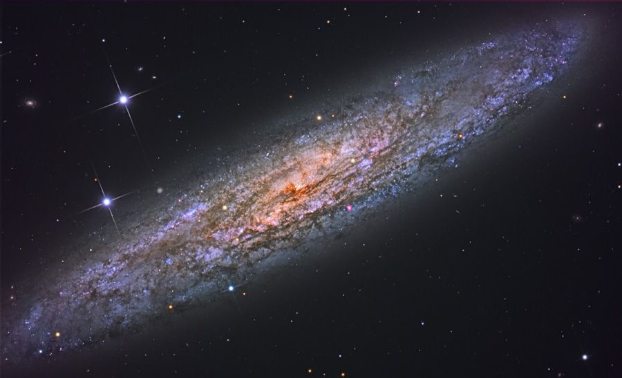 NGC 253: Dusty Island Universe