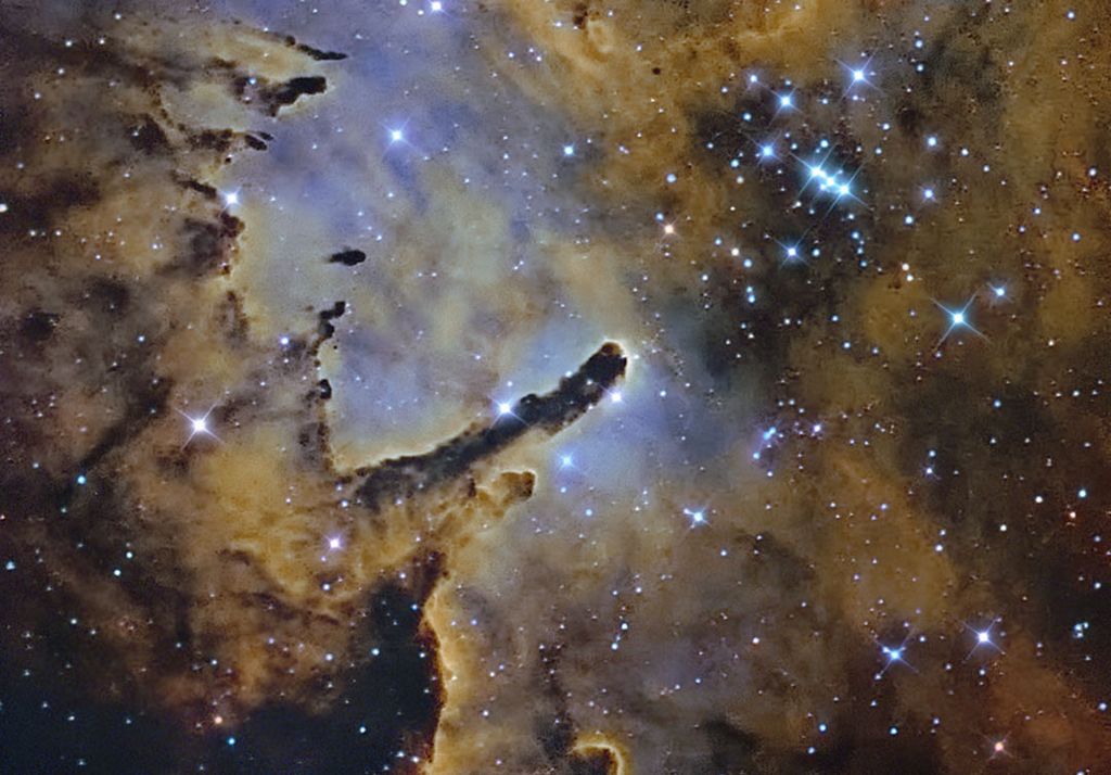 NGC 6823: Cloud Sculpting Star Cluster