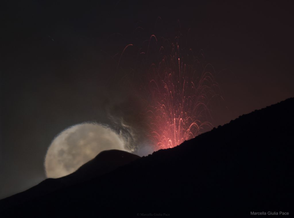 Moon behind Lava Fountain