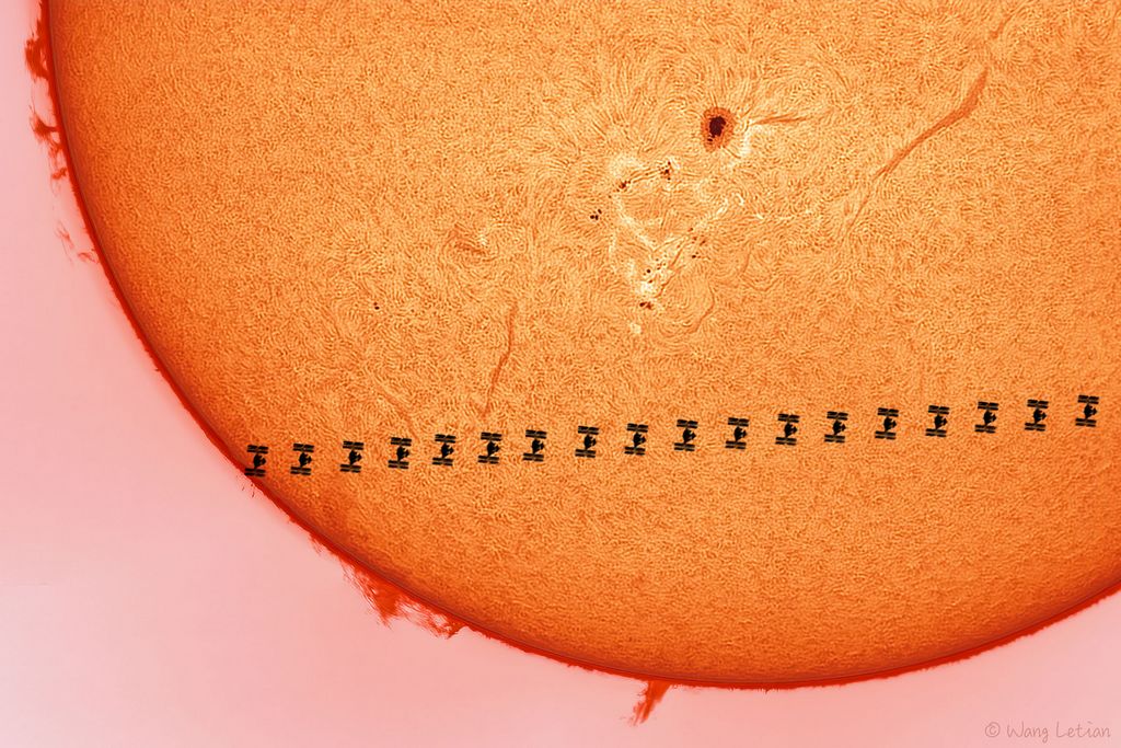 A Space Station Crosses a Busy Sun